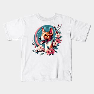 Joyful Basenji Amidst Spring Cherry Blossoms Kids T-Shirt